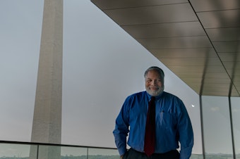 caption: Lonnie Bunch, the founding director of the National Museum of African American History and Culture, stands for a portrait at his office. He will soon become the Smithsonian Institution's new secretary.