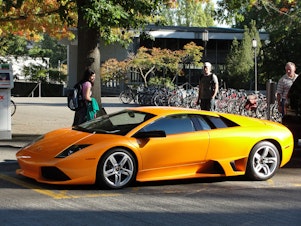 caption: A Lamborghini at the University of Washington. Nearly 2,000 cars in Seattle are listed as having cost more than $80,349 - the current median household income for Seattle.