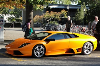 caption: A Lamborghini at the University of Washington. Nearly 2,000 cars in Seattle are listed as having cost more than $80,349 - the current median household income for Seattle.