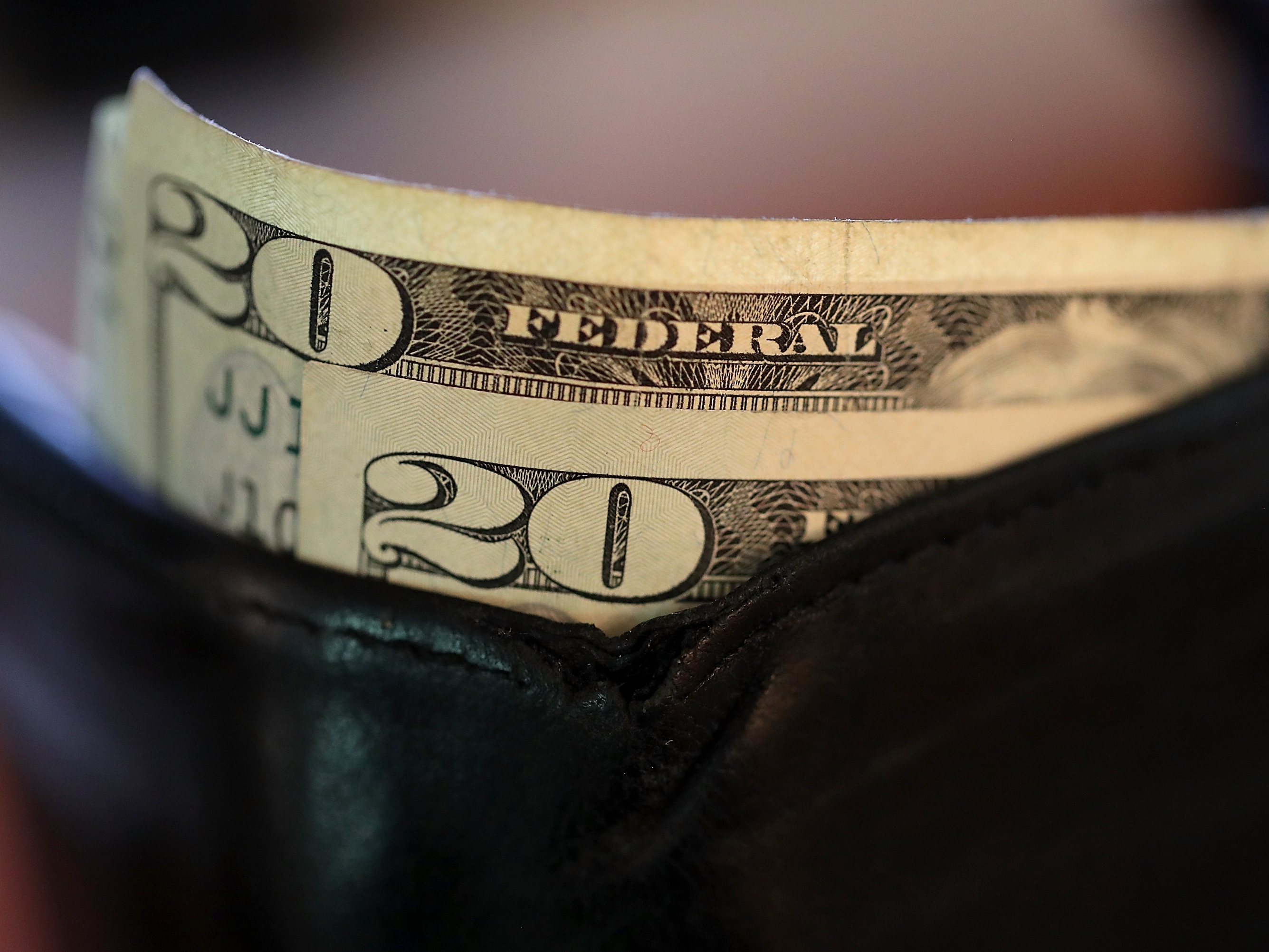 caption: The average tax refund is higher this year, but falls short of promises.