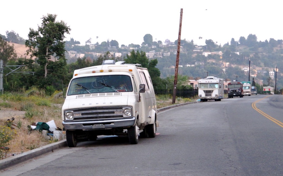 caption: This year's One Night Count showed a drop in people living in their cars or other vehicles.