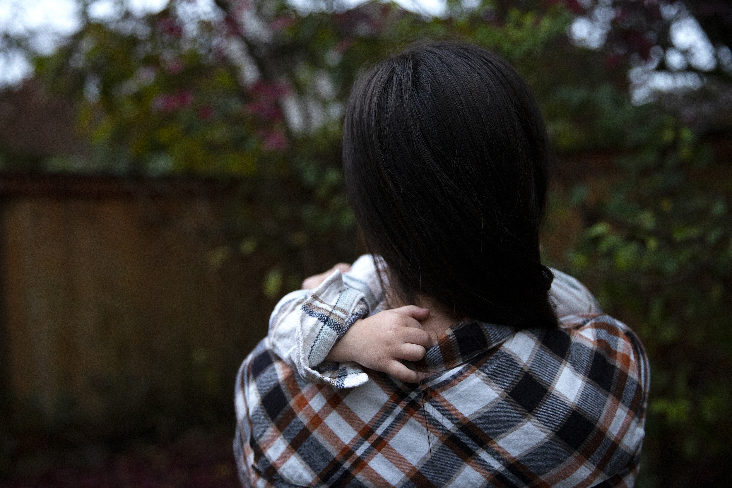 caption: Mariah is portrayed holding her son on Friday, November 21, 2025, at her home in Renton. 