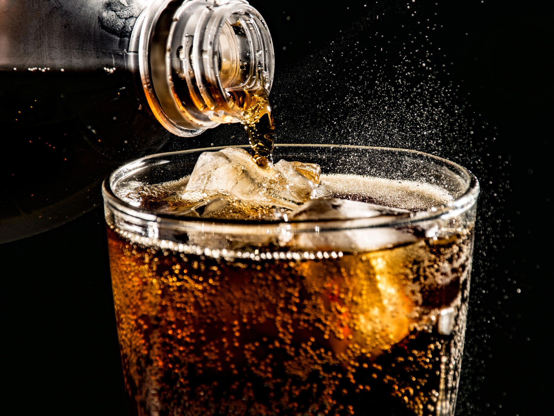 caption: Drinking artificially sweetened diet sodas may lead to increase in appetite and weight gain, research finds.