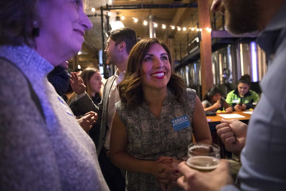 caption: Teresa Mosqueda greets supporters on Tuesday, November 7, 2017, at Optimism Brewing Company in Seattle. 