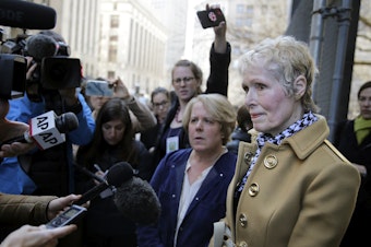 caption: On Twitter, E. Jean Carroll (right) slammed the Department of Justice's attempt to take over her defamation suit against President Trump, telling him to "bring it."