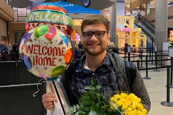 caption: Daniel Wethli got a warm welcome from his mom and dad at the Pittsburgh airport last week after clearing two weeks of quarantine in Southern California. He was studying in Wuhan when the novel coronavirus shut the city down, but never showed any signs of infection.