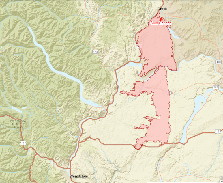 caption: A screenshot from the Northwest Interagency
Coordination Center shows the Cold Springs Canyon Pearl Hill Fire running from Omak in the north down to U.S. 2 in the south.