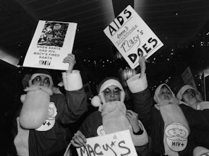 caption: The ACT UP Action Tours activists protested at the Macy's 34th St Store in New York City on Nov. 29, 1991.