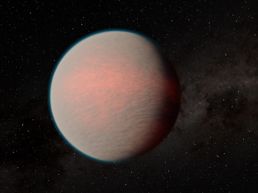 caption: This artist's impression shows a hazy sub-Neptune-sized planet recently observed with the James Webb Space Telescope.
