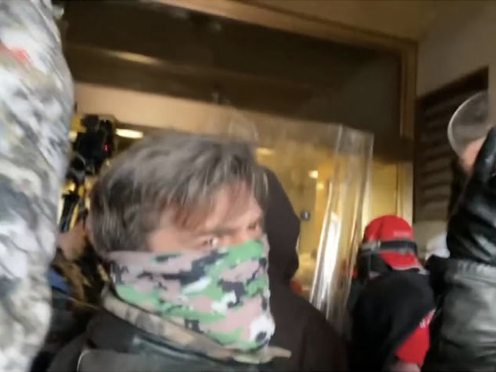 caption: Jay Johnston has pleaded guilty to a felony charge related to the Jan. 6, 2021, attack on the U.S. Capitol. He's seen here in an image from an FBI affidavit.