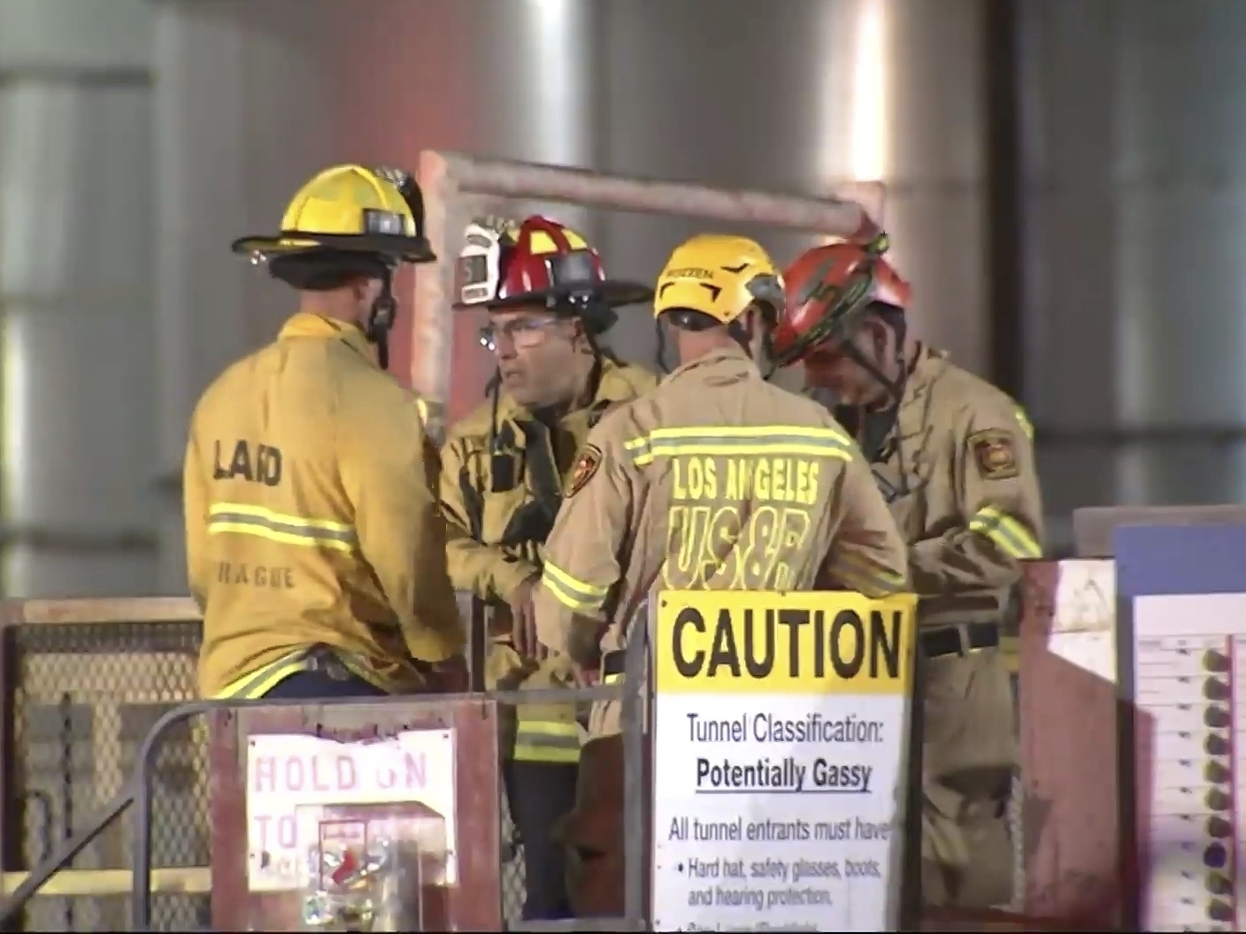 caption: This image taken from footage provided by KABC/ABC7 Los Angeles shows first responders working the scene after a tunnel collapsed on Wednesday, July 9, 2025, in Los Angeles.