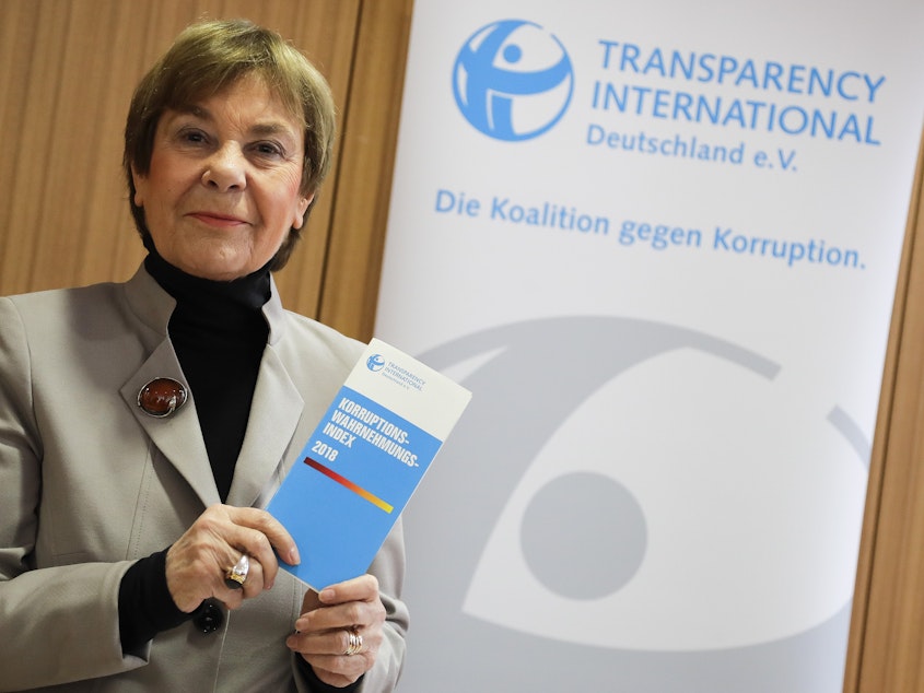 caption: Edda Mueller of Transparency International presents the Corruption Perceptions Index 2018 at a news conference Tuesday in Berlin.