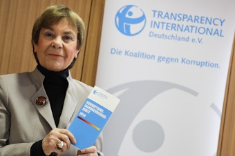 caption: Edda Mueller of Transparency International presents the Corruption Perceptions Index 2018 at a news conference Tuesday in Berlin.
