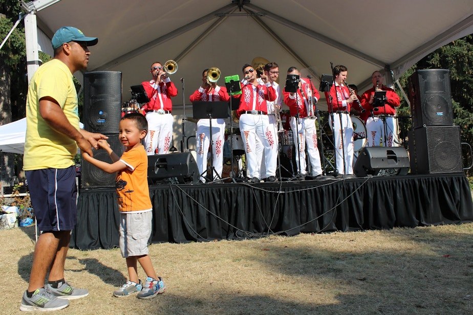 caption: Banda Vagas entertains the audience in Seattle's South Park Duwamish River Festival.