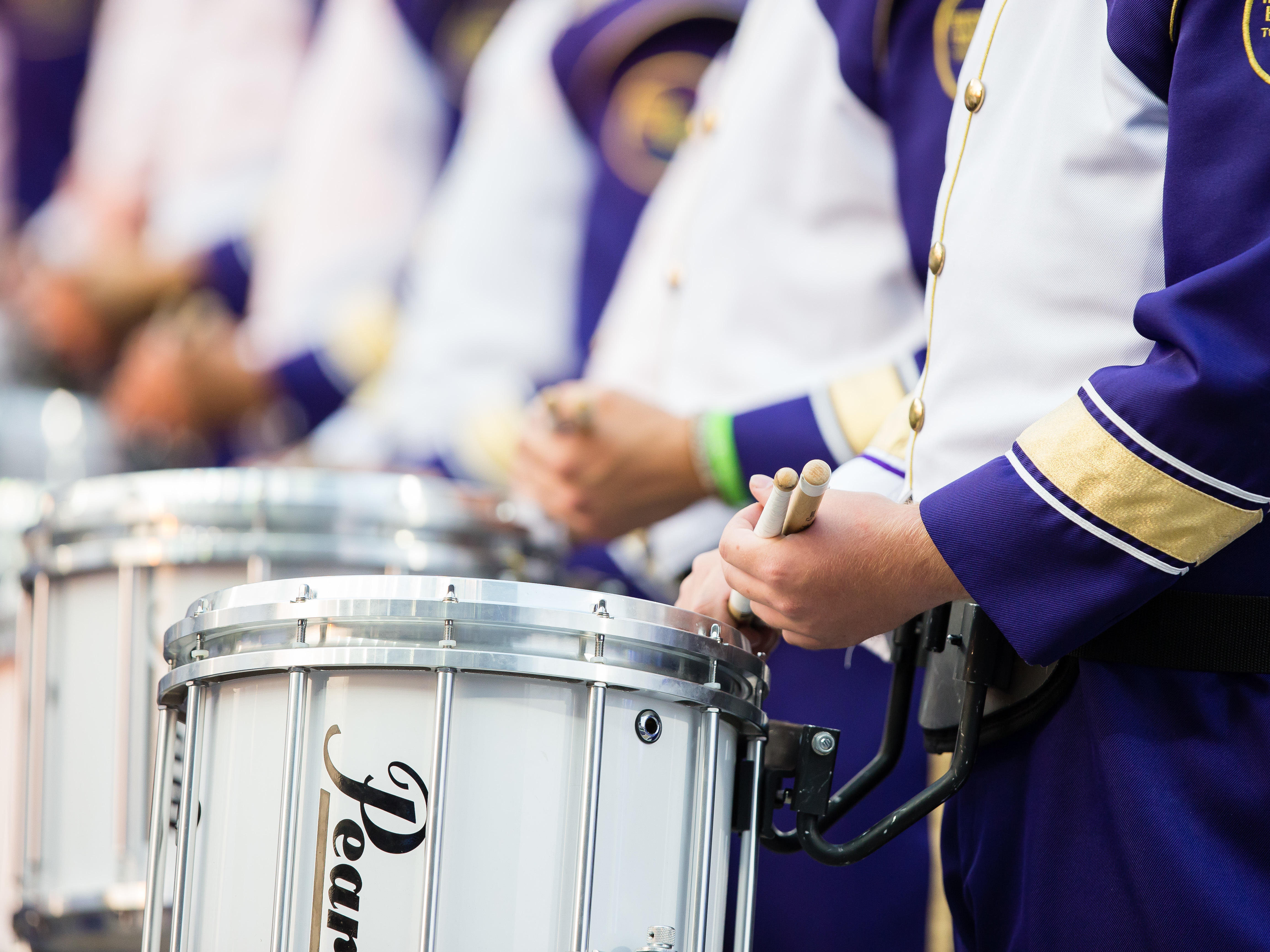 caption: Dozens of members of the University of Washington marching band, shown here in 2017, were transported to hospitals after a bus overturned on Thursday.