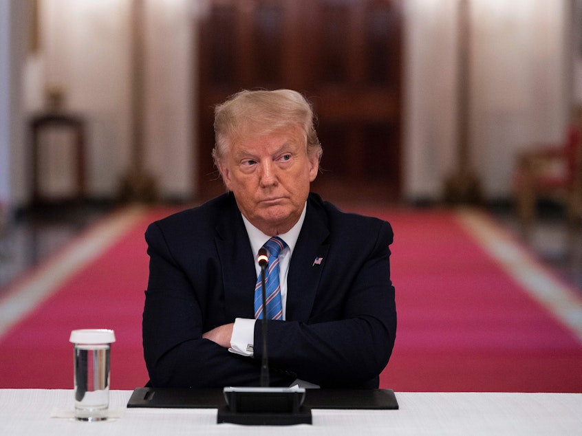 caption: President Trump participates in a White House event Tuesday on how to reopen schools safely. After insisting that the Republican National Convention should be in person with thousands of people, Trump said he is "flexible" about the format.