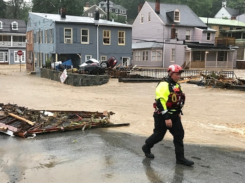 caption: Floods in Ellicott City, Maryland, pushed cars into a pile last May. This year has been a year of record rainfall for cities throughout the mid-Atlantic and Carolinas.