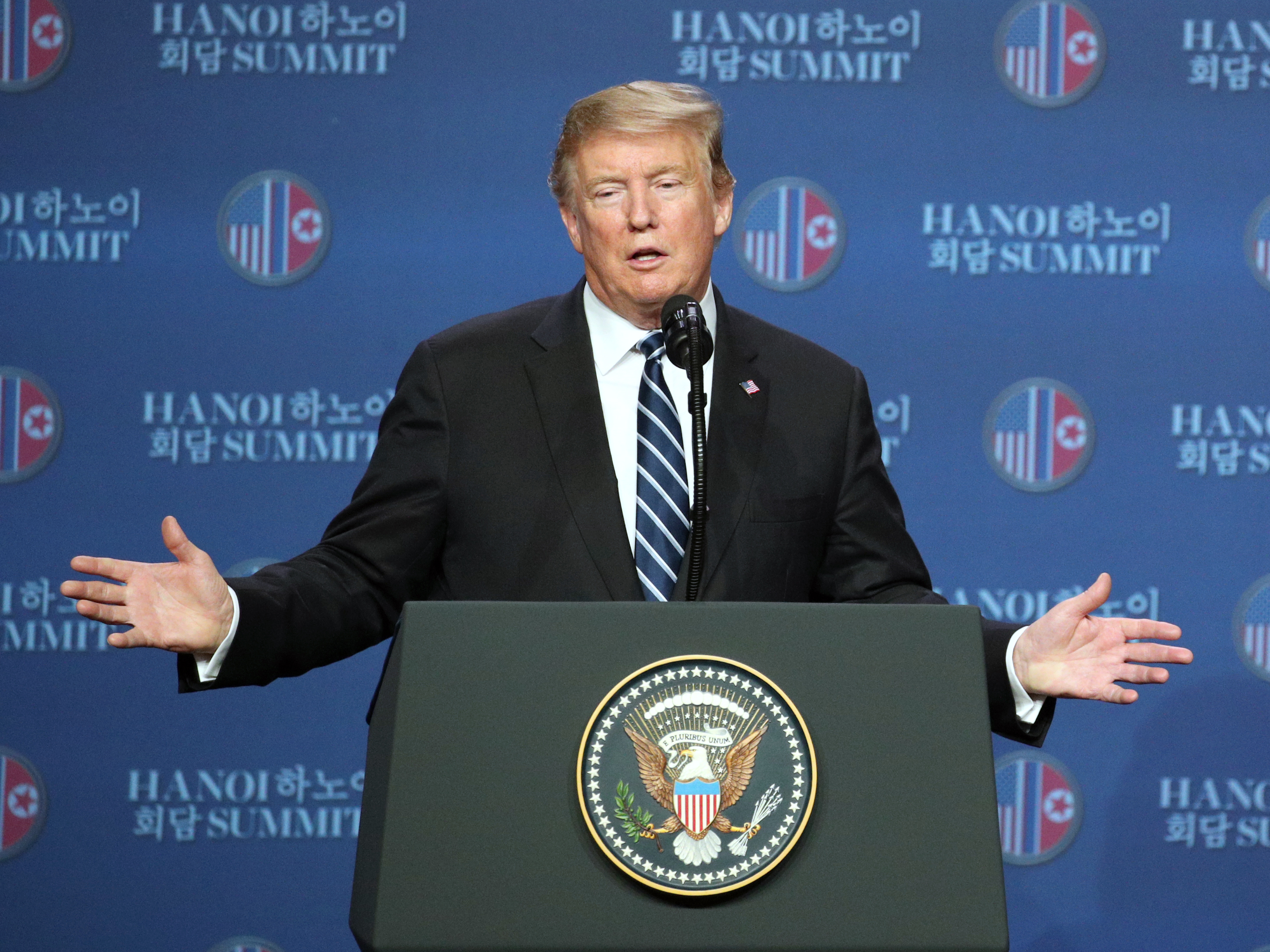 caption: President Trump speaks as Secretary of State Mike Pompeo looks on during a news conference following the DPRK-USA Hanoi Summit in Hanoi, on Thursday. Trump's second summit with Kim collapsed Thursday without an agreement between the two leaders.
