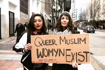 caption: Saara Majid (left) with their friend Samira Shifteh at a protest in downtown Seattle.
