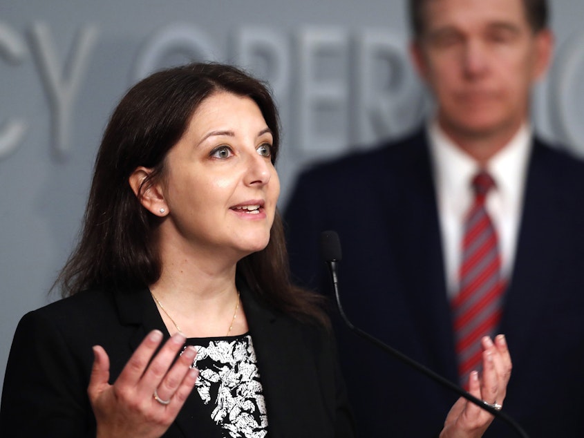 caption: Mandy Cohen, secretary of the North Carolina Department of Health and Human Services, speaks during a briefing on the COVID-19 pandemic at the Emergency Operations Center in Raleigh, N.C., on May 26.