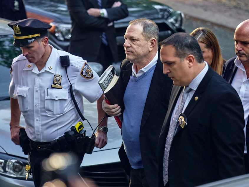 caption: In May, Harvey Weinstein turned himself in to police following allegations by several women of sexual misconduct.