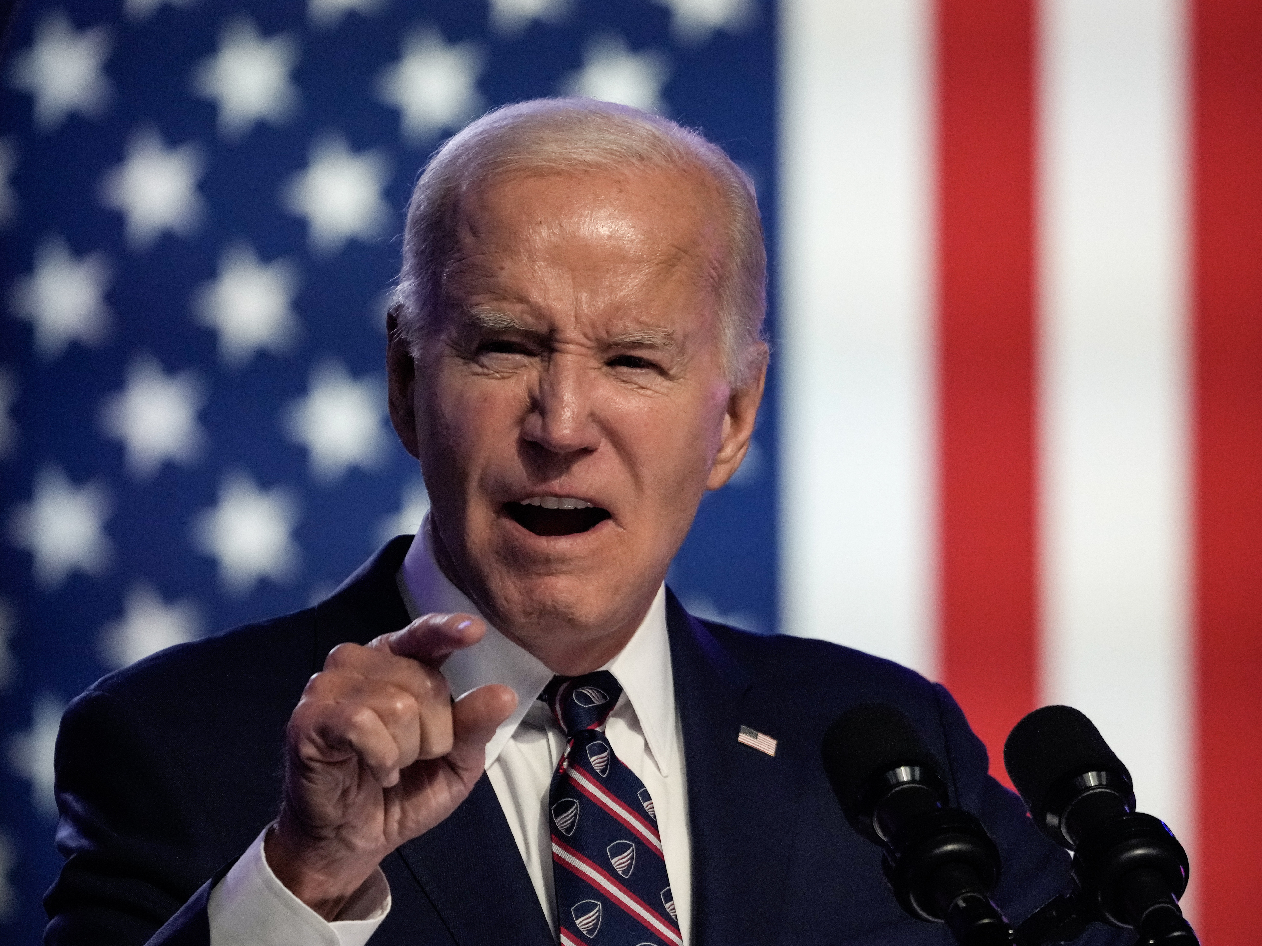 caption: President Biden speaks during a campaign event in Blue Bell, Pa. — his first campaign speech of 2024 — where he made a point of calling former President Donald Trump a "loser."