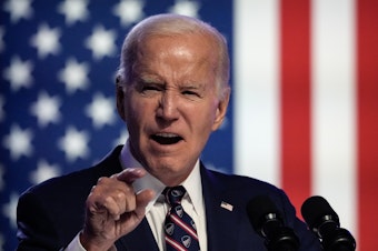 caption: President Biden speaks during a campaign event in Blue Bell, Pa. — his first campaign speech of 2024 — where he made a point of calling former President Donald Trump a "loser."