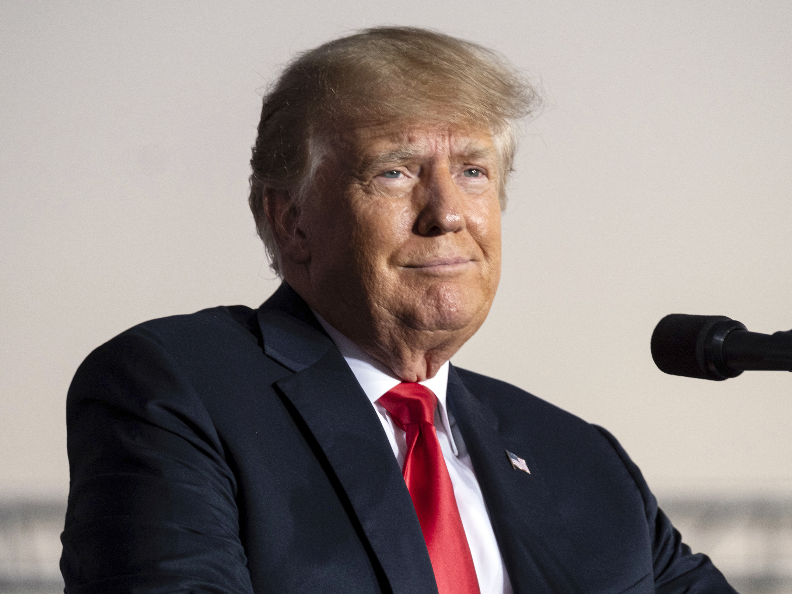 caption: Former President Donald Trump speaks during a rally in Perry, Ga., on Sept. 25, 2021.