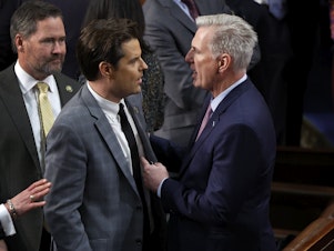 caption: U.S. House Republican Leader Kevin McCarthy talks to then-Rep.-elect Matt Gaetz, R-Fla., in the House Chamber during the fourth day of voting for speaker of the House in January.