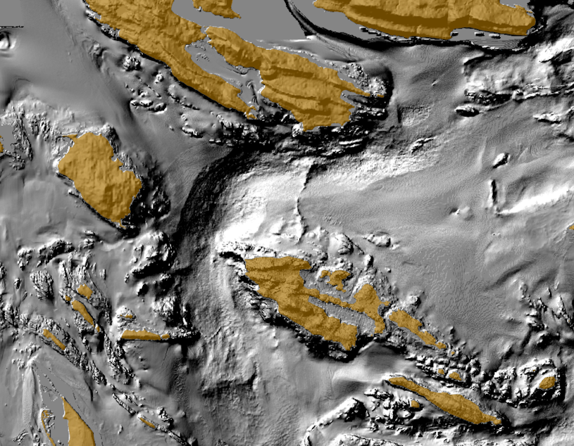 caption: A bathymetric map shows Washington's Stuart Island (center) and underwater contours including the deep gouge off Turn Point, Stuart's western tip.