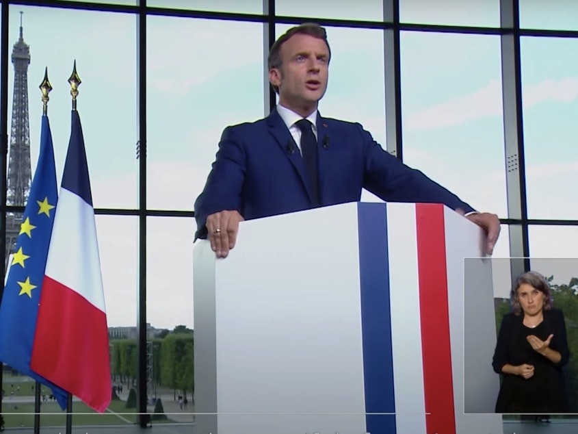 caption: "It's a question of individual responsibility" to get vaccinated against COVID-19, French President Emmanuel Macron said on Monday. His new policy will require a special "health pass" for anyone wanting to visit restaurants.