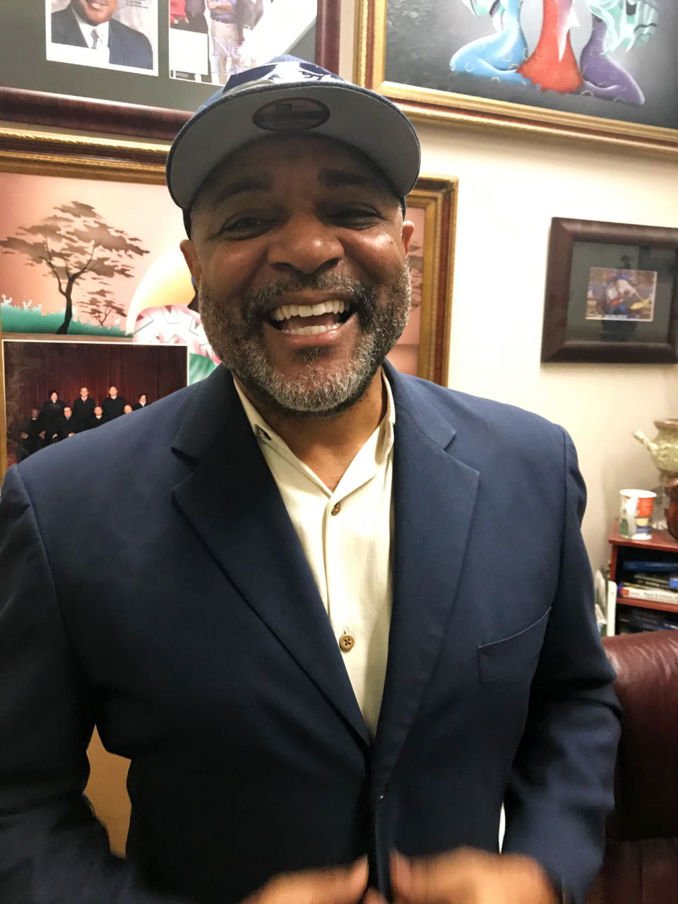 caption: Dr. Carl Livingston is pastor and a professor of Political Science 