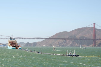 caption: Ocean Cleanup's System 001 was towed out of the San Francisco Bay on Sept. 8, 2018.