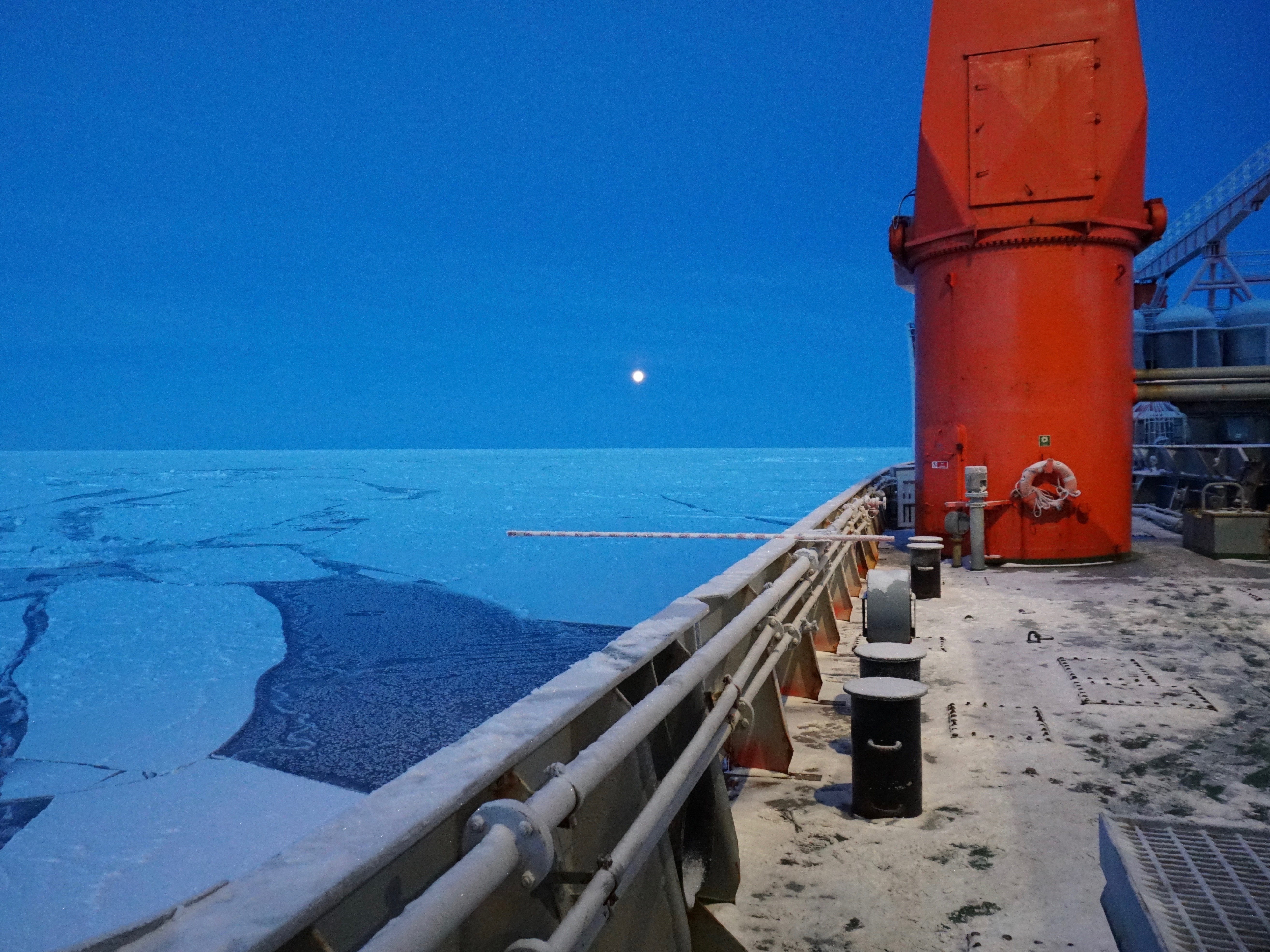 caption: Researchers and others studying the warming Arctic may have to double their six-week shift on the ice because of coronavirus related travel restrictions.