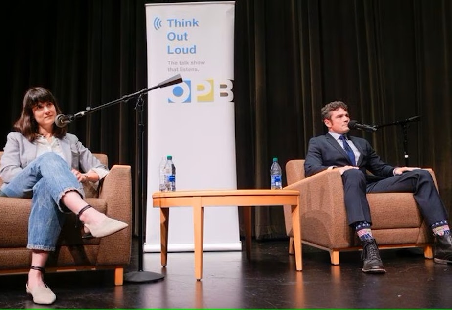 caption: Democrat Marie Gluesenkamp Perez and Republican Joe Kent are vying for Washington state's 3rd Congressional District seat. They participated in a debate moderated by Oregon Public Broadcasting host Dave Miller held at the Wollenberg Auditorium on the campus of Lower Columbia College in Longview, Washington on October 27, 2022.
