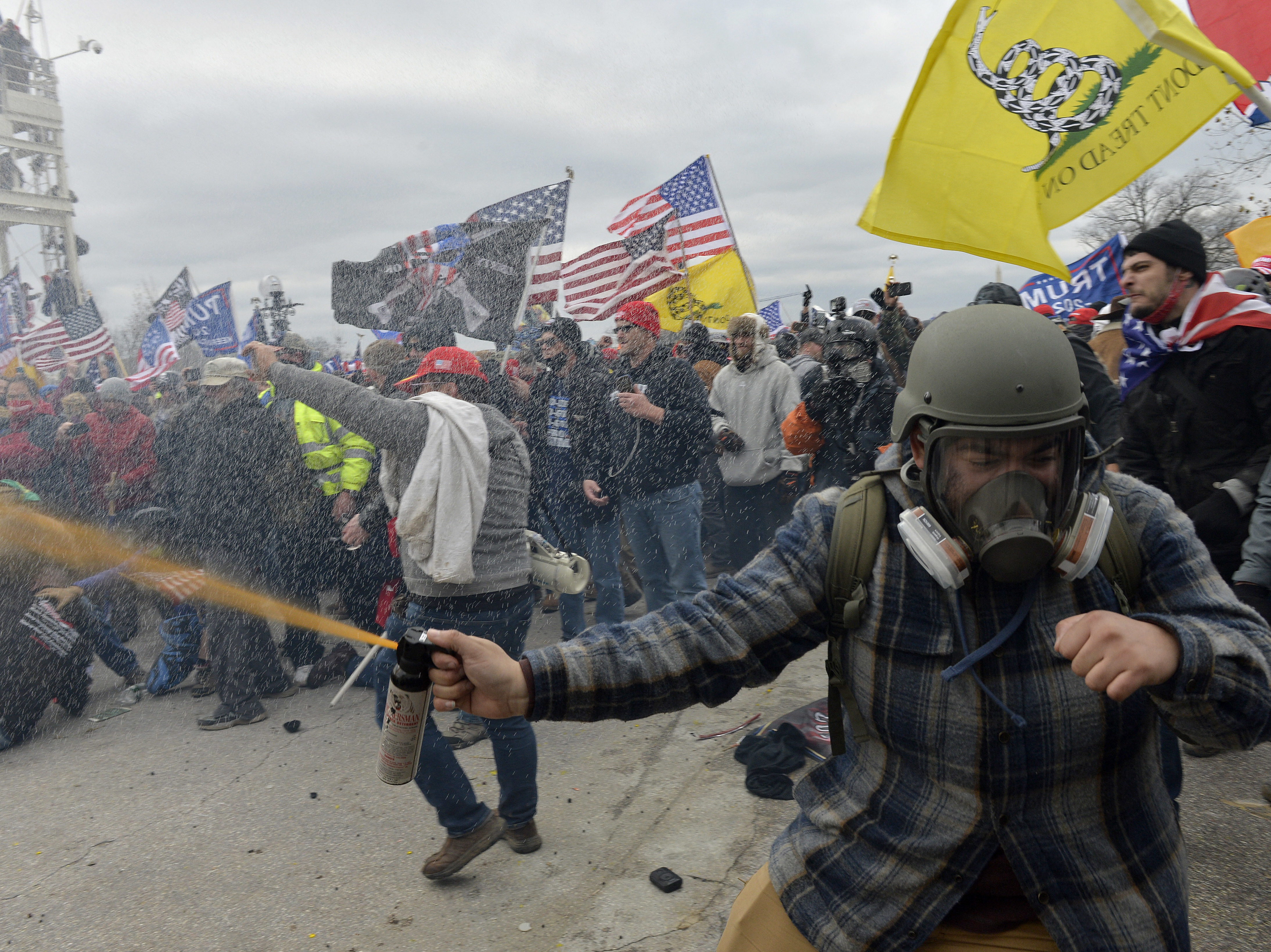 caption: Trump supporters clash with police and security forces as rioters try to storm the U.S. Capitol on Jan. 6, 2021.