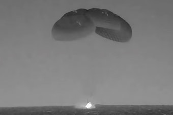 caption: In this image from video made available by NASA, the SpaceX Crew Dragon, slowed by parachutes, splashes down in the Atlantic Ocean off the Florida coast, Monday, Sept. 4, 2023, as it returns to Earth with NASA astronauts Stephen Bowen and Woody Hoburg, United Arab Emirates astronaut Sultan AlNeyadi and Roscosmos cosmonaut Andrey Fedyaev after a six-month stay at the International Space Station.