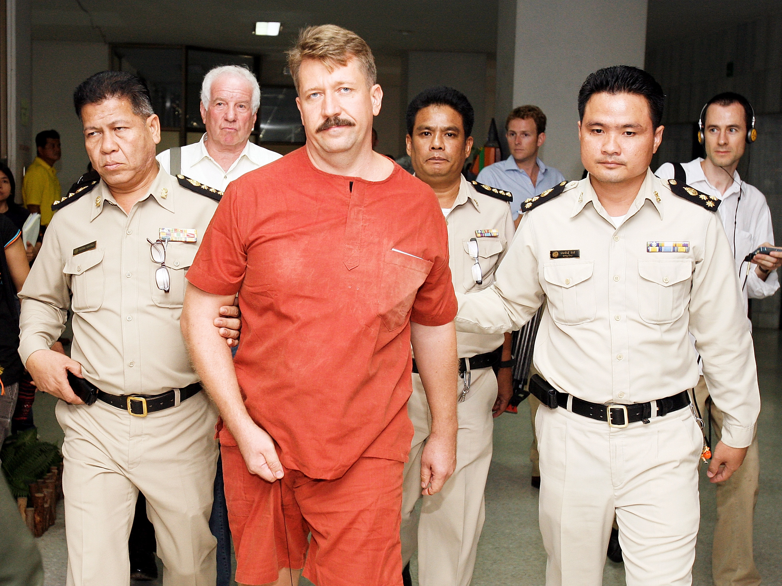 caption: Russian arms dealer Viktor Bout is shown in custody in Bangkok, Thailand, in 2008. Bout was later extradited to the U.S. and convicted of conspiring to kill Americans. He's serving a 25-year sentence, but he may be part of a prisoner swap the U.S. and Russia are trying to negotiate.