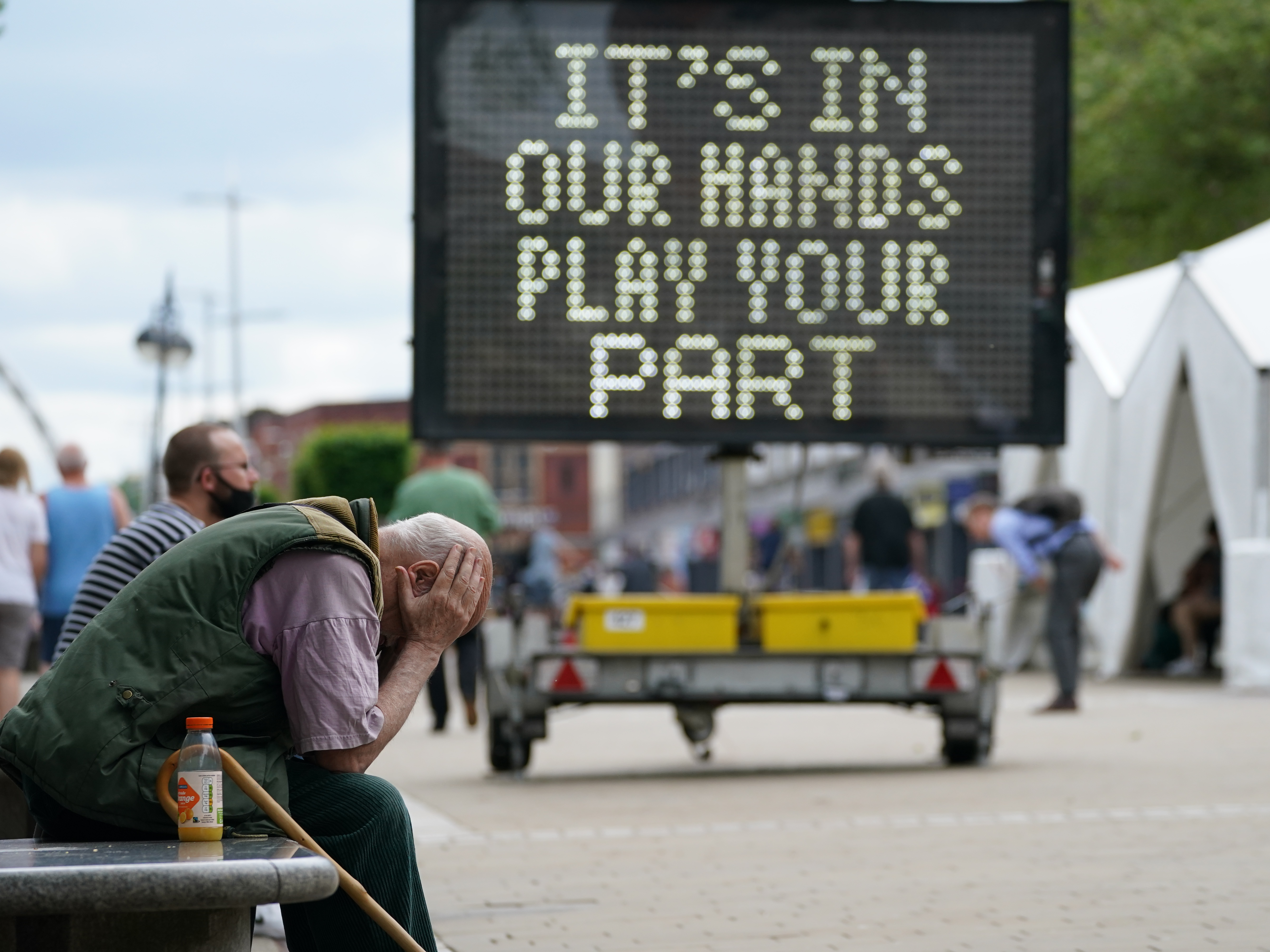 caption: A mobile COVID-19 vaccination center in Bolton, U.K., sends a message earlier this month. Variants that were first found in various places are wreaking havoc on the global fight to control this coronavirus.
