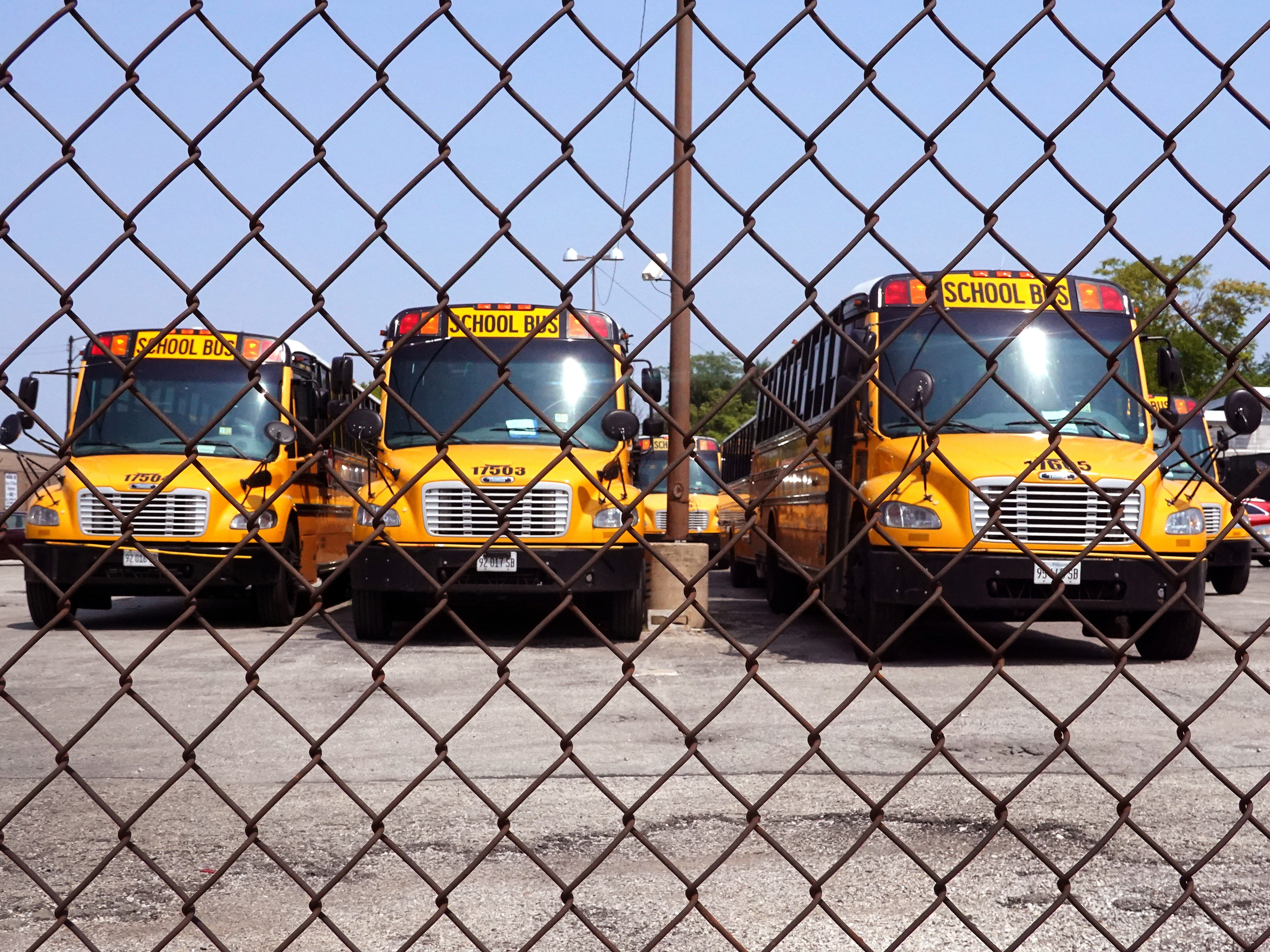caption: Black girls had the highest rates of so-called "exclusionary discipline," such as suspensions and expulsions, according to a new report from the GAO. Above, school busses sit at a service yard last year in Chicago. 