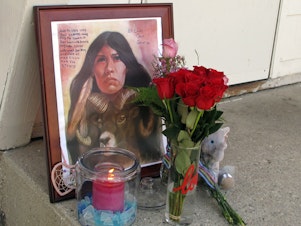 caption: A memorial to Savanna LaFontaine-Greywind outside the apartment where Greywind lived with her parents in Fargo, N.D., pictured in 2017. Savanna's Act requires the Department of Justice to strengthen training, coordination and data collection in cases of murdered or missing Native Americans.