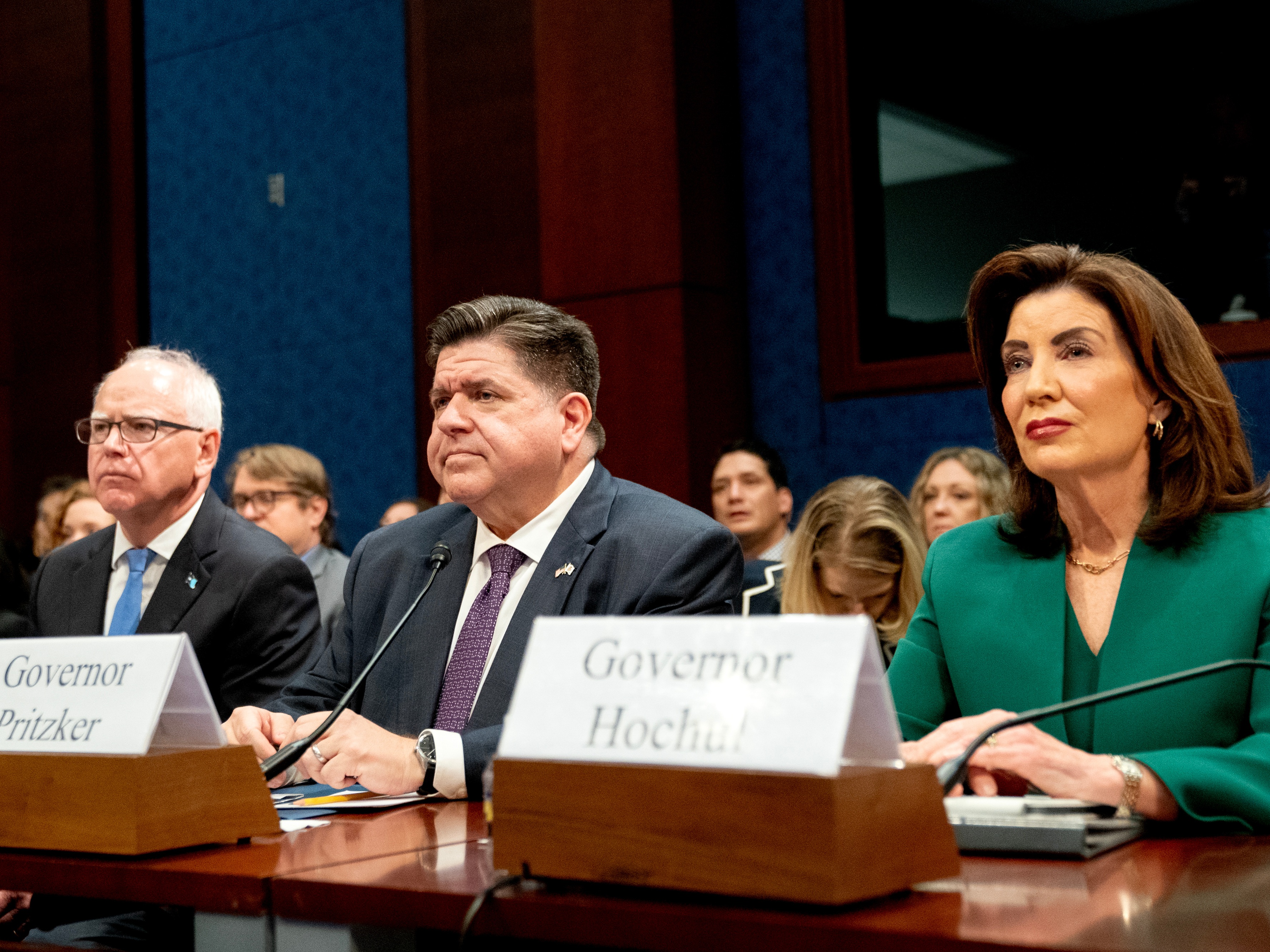 caption: Tim Walz, governor of Minnesota, from left, J.B. Pritzker, governor of Illinois, and Kathy Hochul, governor of New York, during a House Oversight and Accountability Committee hearing in Washington, DC, US, on Thursday, June 12, 2025. For Republicans, the hearing is a chance to amplify an issue important to President Donald Trump and perhaps regain control of the sanctuary narrative after DHS published a list of jurisdictions it identified as hostile to immigration law enforcement, and then pulled it down af