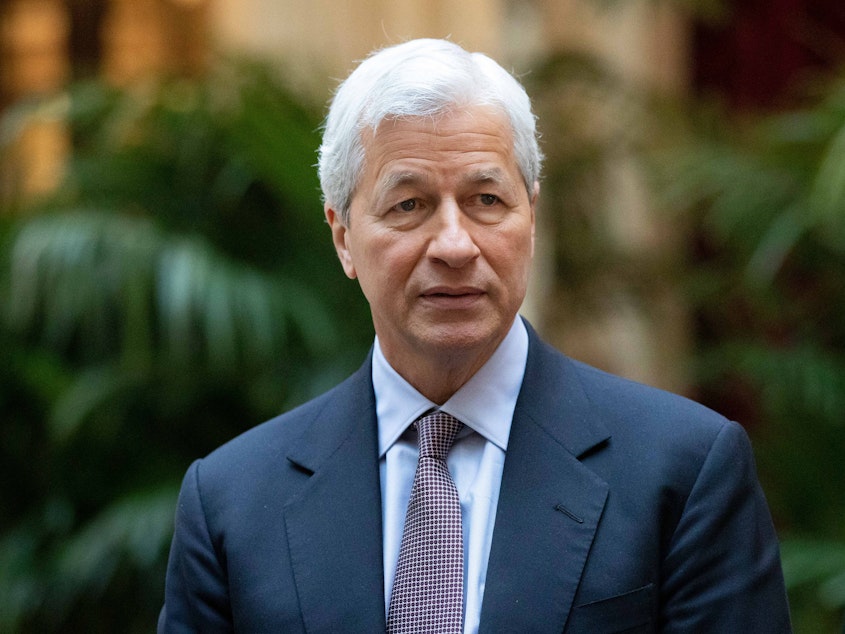 caption: Jamie Dimon, chief executive officer of JPMorgan Chase, has called for some workers to start returning to the office, fearing the impact of logging in from home for too long.