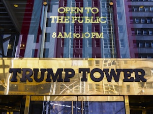 caption: The 58-story Trump Tower in Midtown Manhattan is headquarters for the Trump Organization, as well as containing Donald Trump's penthouse condominium residence.