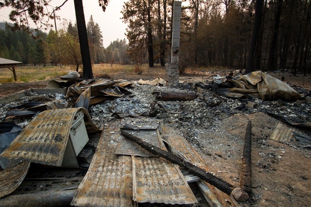 caption: <p>A burned cabin that was destroyed in Washington's 2014 Carlton Complex wildfire.</p>