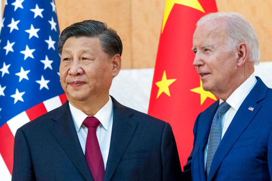 caption: U.S. President Joe Biden, right, stands with Chinese President Xi Jinping before a meeting on the sidelines of the G20 summit meeting, Monday, Nov. 14, 2022, in Bali, Indonesia. Biden says Chinese counterpart Xi has agreed to resume crucial talks on climate between the two countries. The Chinese and U.S. leaders met Monday on the sidelines of the Group of 20 summit in Bali. 