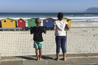 caption: The author's two children at a South African beach.