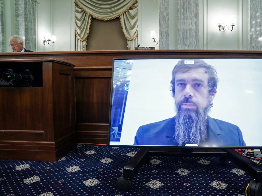 caption: Twitter CEO Jack Dorsey testifies over video during a Senate Commerce Committee hearing on Wednesday about reforming Section 230, a key legal shield for tech companies.