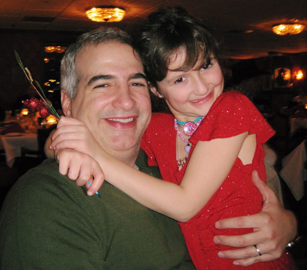 caption: A young Laila Shadid with her dad, Anthony Shadid. (Courtesy of Laila Shadid)