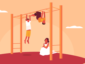 Boys climb on monkey bars, but the girl in the pic can't because she's wearing a dress.